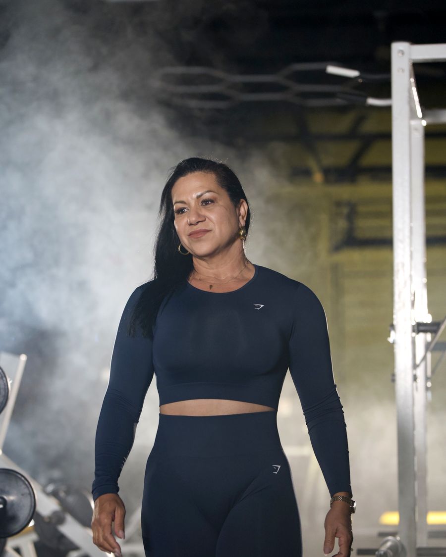 Karina Marval walking through gym haze